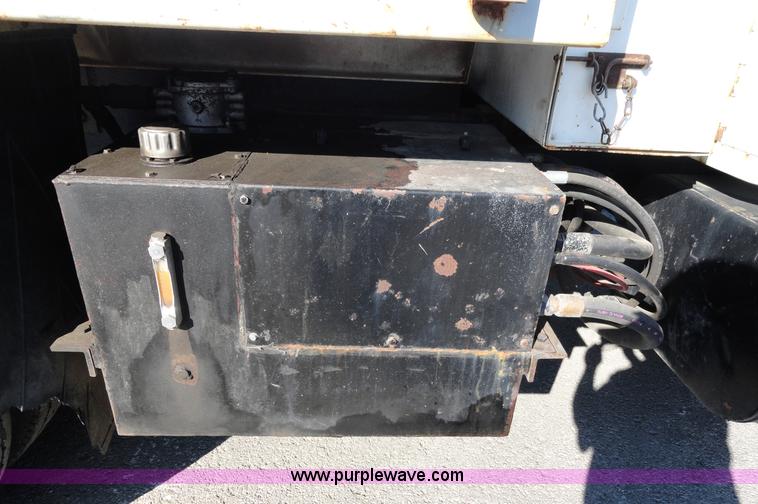 image for item A2417 1992 International 4900 tandem axle dump truck with plow and spreader