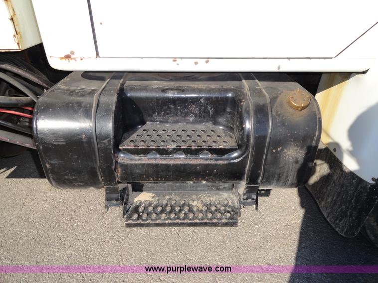 image for item A2417 1992 International 4900 tandem axle dump truck with plow and spreader