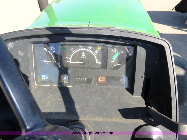 image for item A2418 1994 John Deere 5400 utility tractor