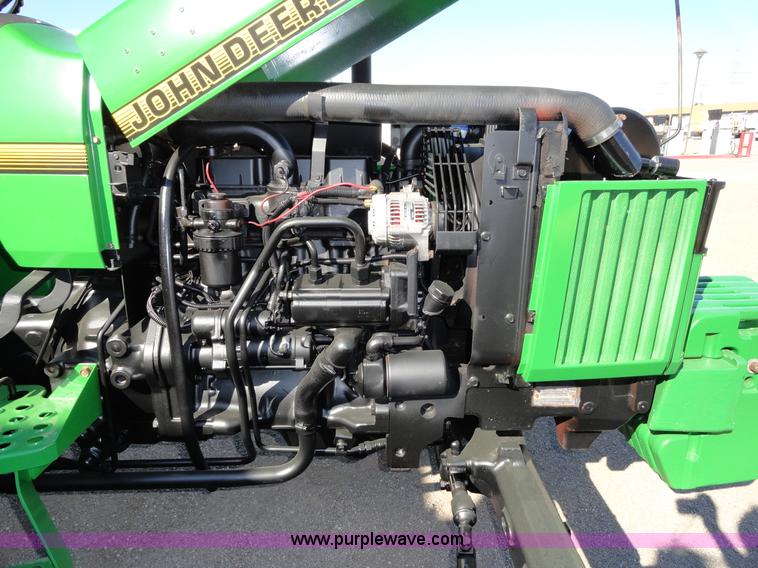 image for item A2418 1994 John Deere 5400 utility tractor