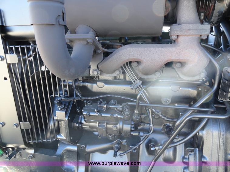 image for item A2418 1994 John Deere 5400 utility tractor