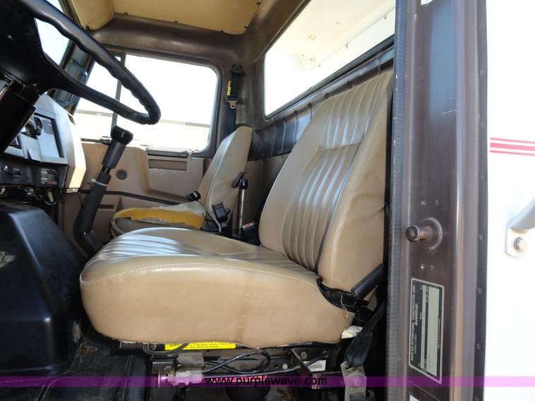 image for item A2421 1992 International 4900 tandem axle dump truck with plow and spreader