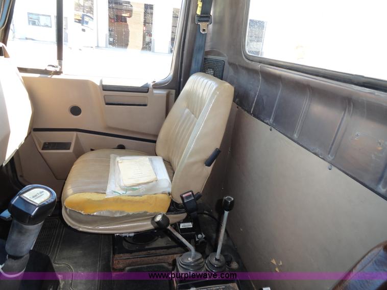 image for item A2421 1992 International 4900 tandem axle dump truck with plow and spreader