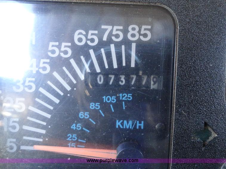 image for item A2421 1992 International 4900 tandem axle dump truck with plow and spreader