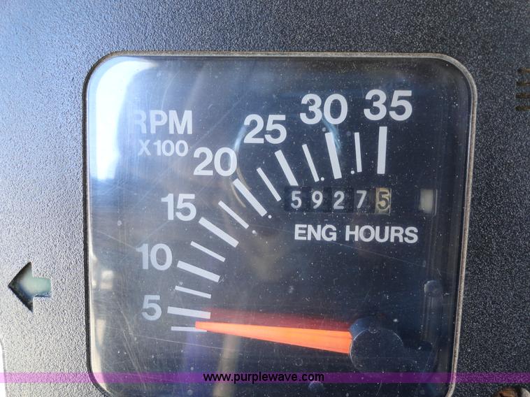 image for item A2421 1992 International 4900 tandem axle dump truck with plow and spreader