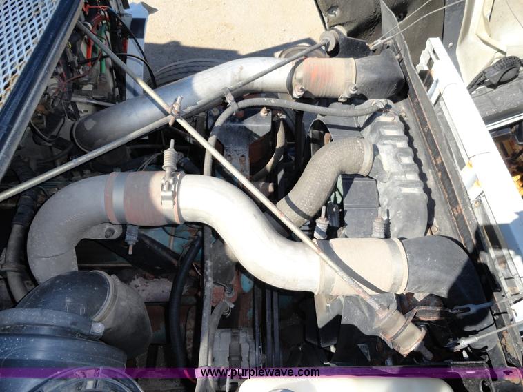 image for item A2421 1992 International 4900 tandem axle dump truck with plow and spreader