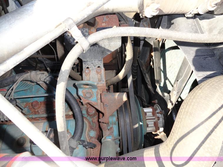 image for item A2421 1992 International 4900 tandem axle dump truck with plow and spreader