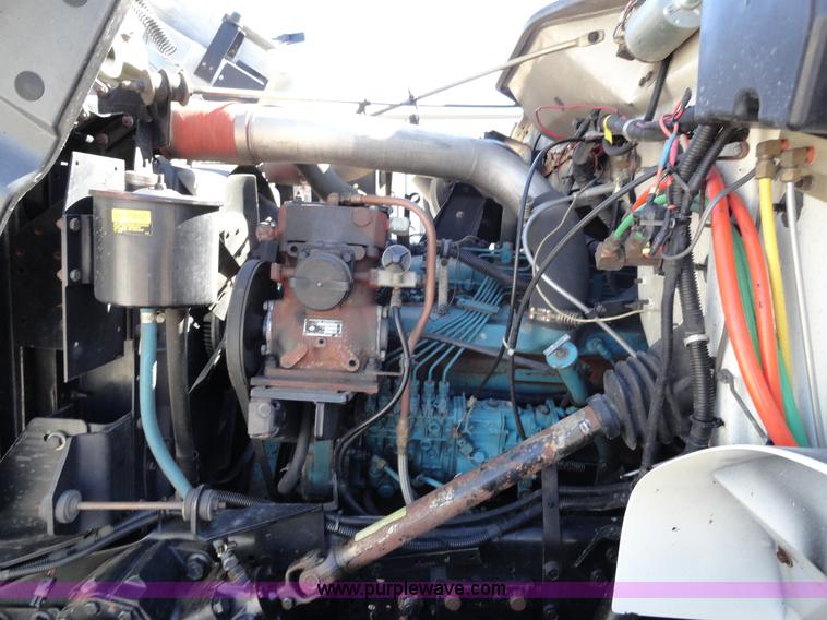 image for item A2421 1992 International 4900 tandem axle dump truck with plow and spreader