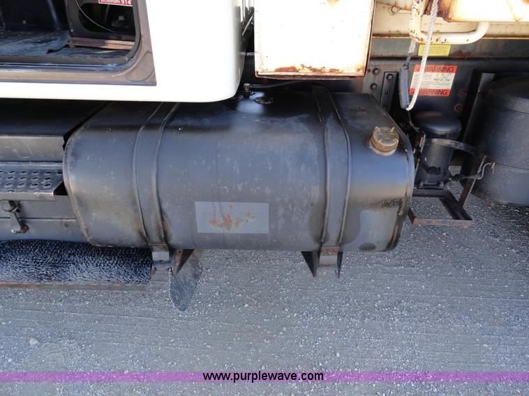 image for item A2421 1992 International 4900 tandem axle dump truck with plow and spreader