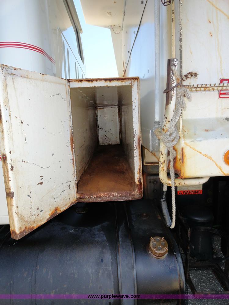 image for item A2421 1992 International 4900 tandem axle dump truck with plow and spreader