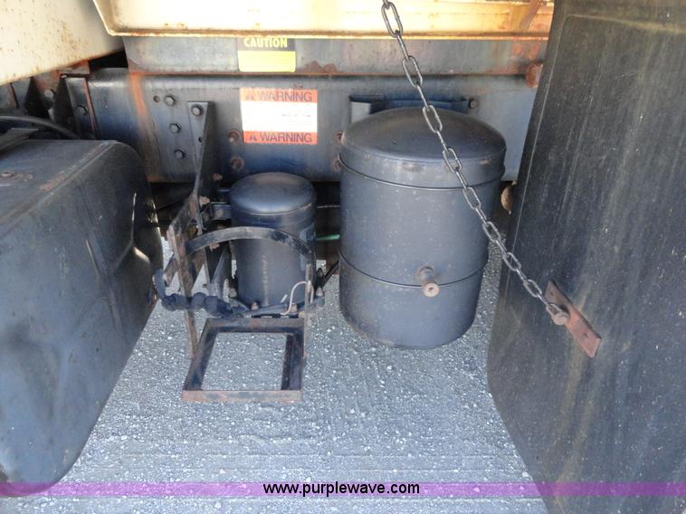 image for item A2421 1992 International 4900 tandem axle dump truck with plow and spreader