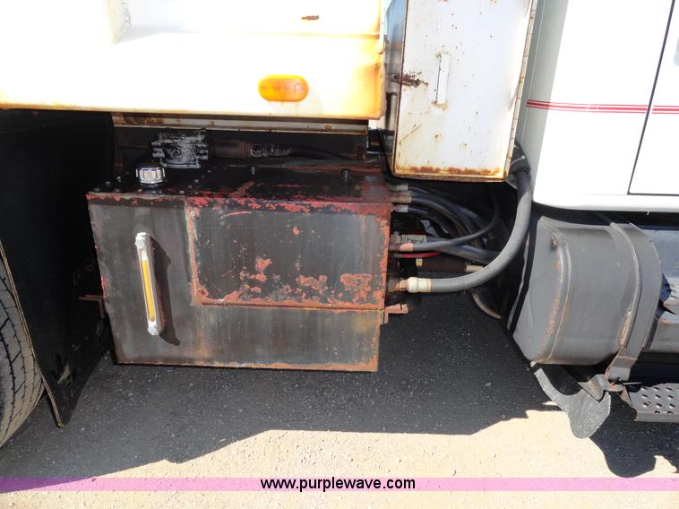 image for item A2421 1992 International 4900 tandem axle dump truck with plow and spreader