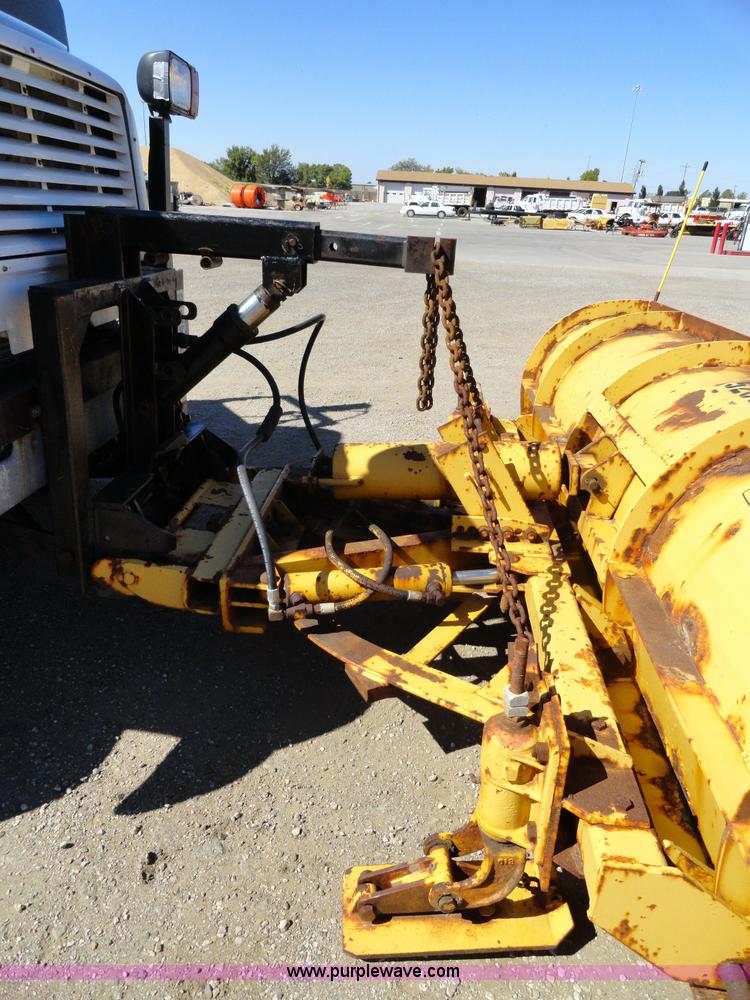 image for item A2421 1992 International 4900 tandem axle dump truck with plow and spreader