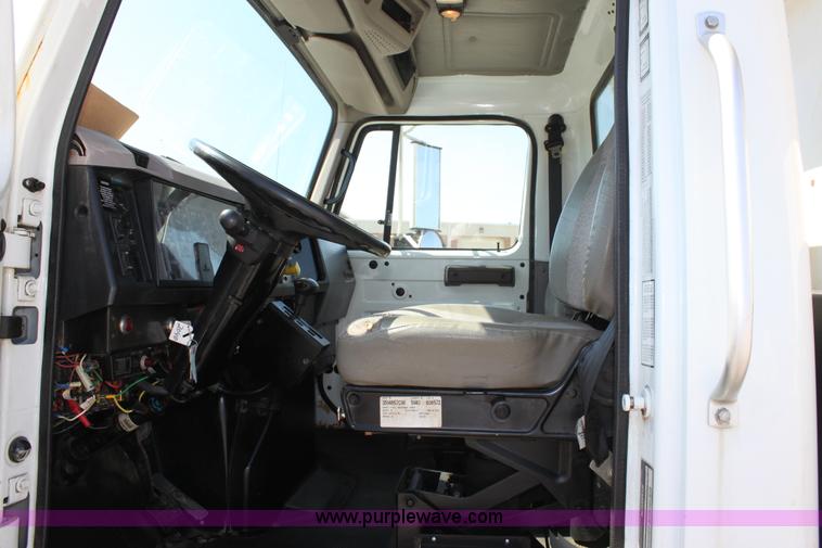 image for item A2891 1999 International 4900 tandem axle dump truck with plow and spreader