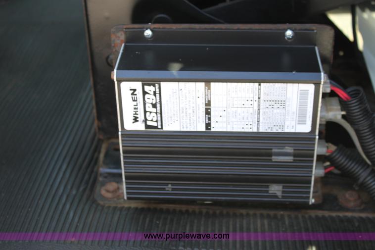 image for item A2891 1999 International 4900 tandem axle dump truck with plow and spreader