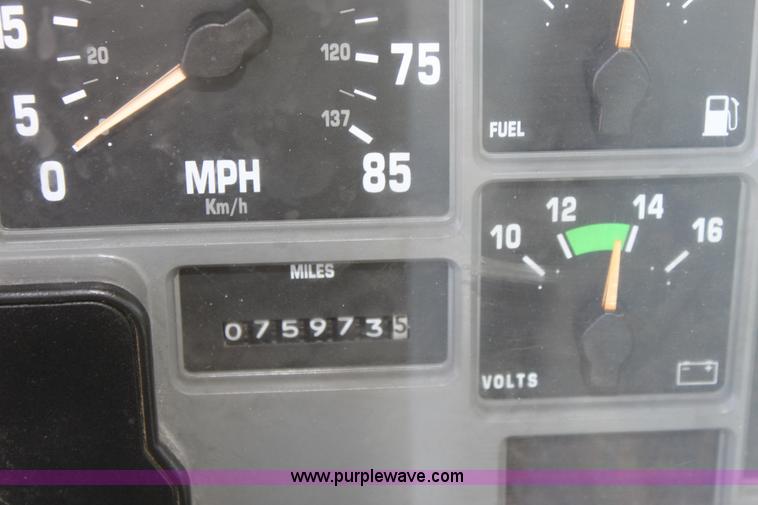 image for item A2891 1999 International 4900 tandem axle dump truck with plow and spreader