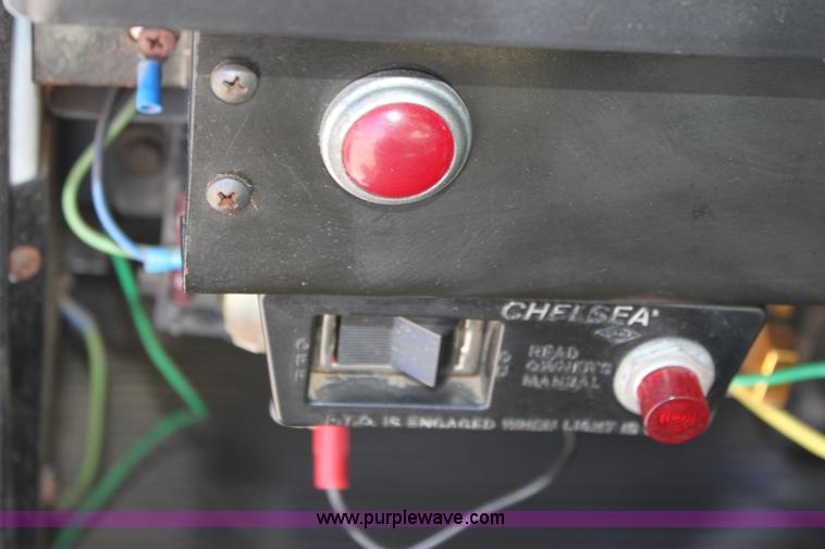 image for item A2891 1999 International 4900 tandem axle dump truck with plow and spreader