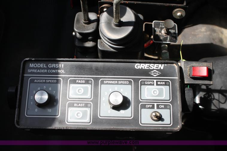 image for item A2891 1999 International 4900 tandem axle dump truck with plow and spreader