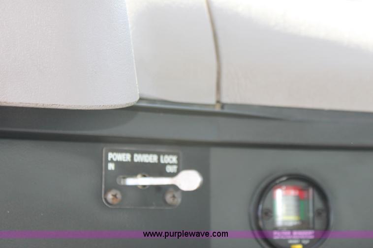 image for item A2891 1999 International 4900 tandem axle dump truck with plow and spreader