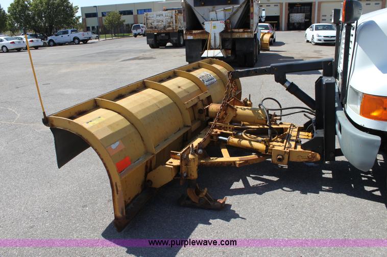 image for item A2891 1999 International 4900 tandem axle dump truck with plow and spreader