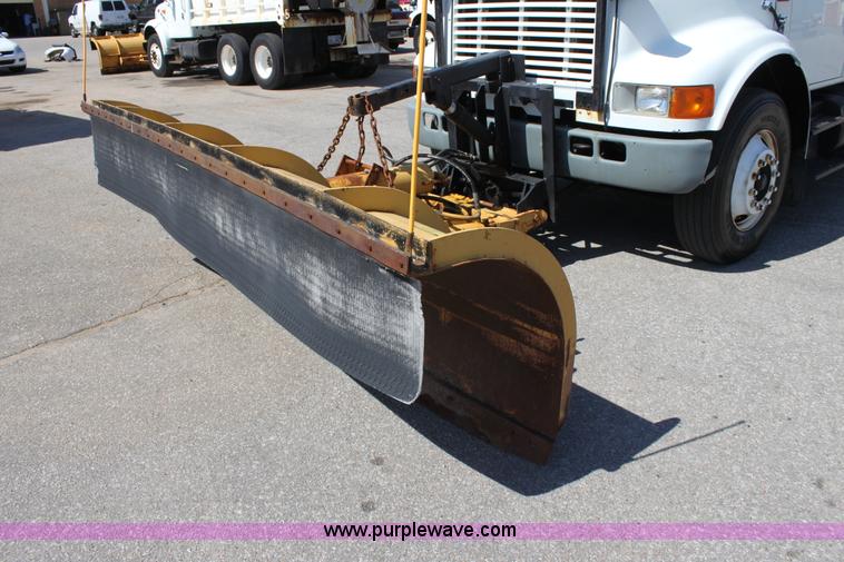 image for item A2891 1999 International 4900 tandem axle dump truck with plow and spreader