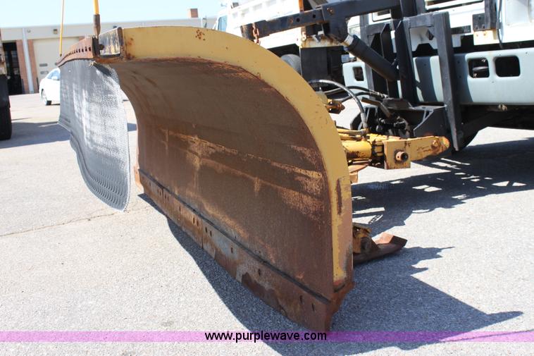 image for item A2891 1999 International 4900 tandem axle dump truck with plow and spreader