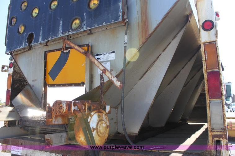 image for item A2891 1999 International 4900 tandem axle dump truck with plow and spreader