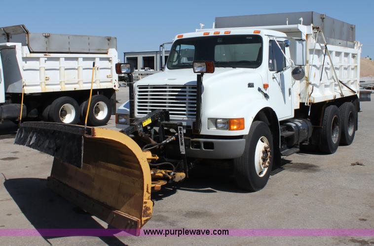 image for item A2892 1995 International 4900 tandem axle dump truck with plow and spreader