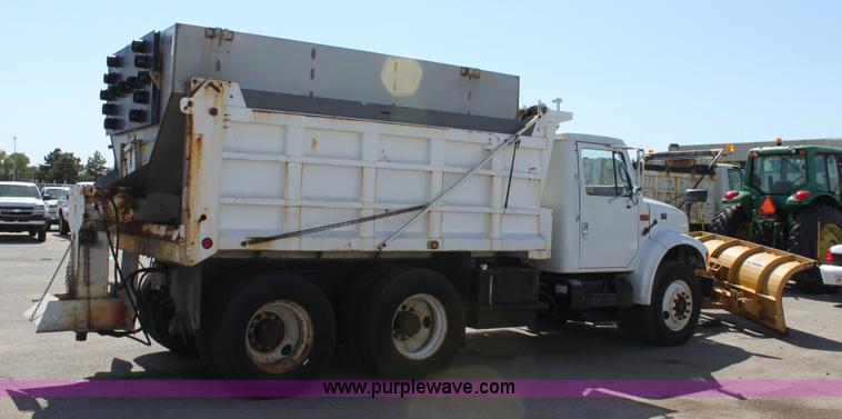 image for item A2892 1995 International 4900 tandem axle dump truck with plow and spreader