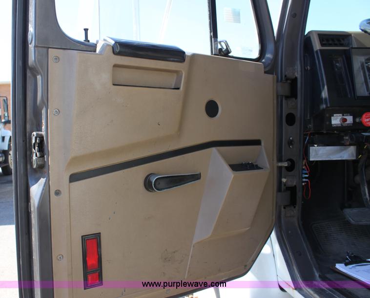 image for item A2892 1995 International 4900 tandem axle dump truck with plow and spreader