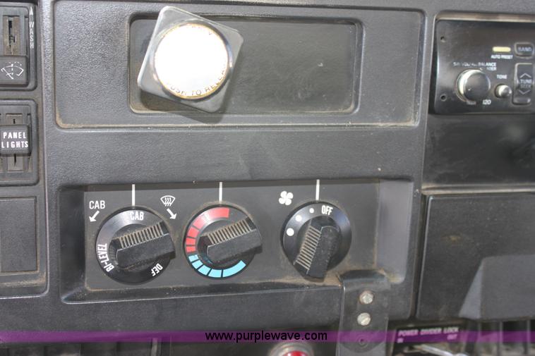 image for item A2892 1995 International 4900 tandem axle dump truck with plow and spreader