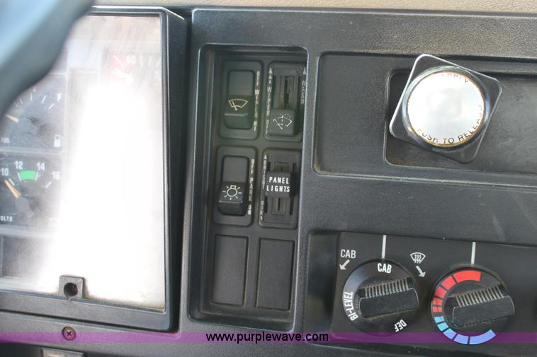 image for item A2892 1995 International 4900 tandem axle dump truck with plow and spreader