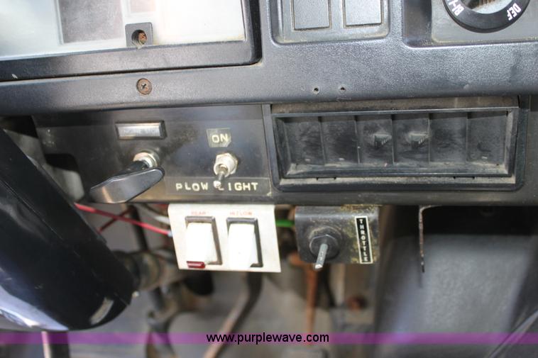 image for item A2892 1995 International 4900 tandem axle dump truck with plow and spreader