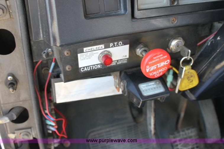 image for item A2892 1995 International 4900 tandem axle dump truck with plow and spreader