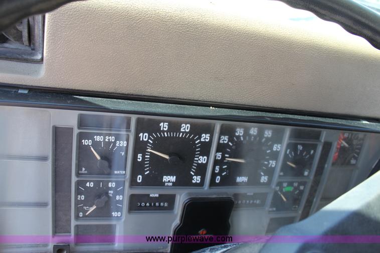 image for item A2892 1995 International 4900 tandem axle dump truck with plow and spreader