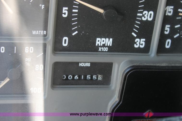 image for item A2892 1995 International 4900 tandem axle dump truck with plow and spreader