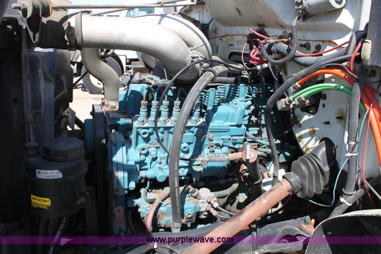 image for item A2892 1995 International 4900 tandem axle dump truck with plow and spreader