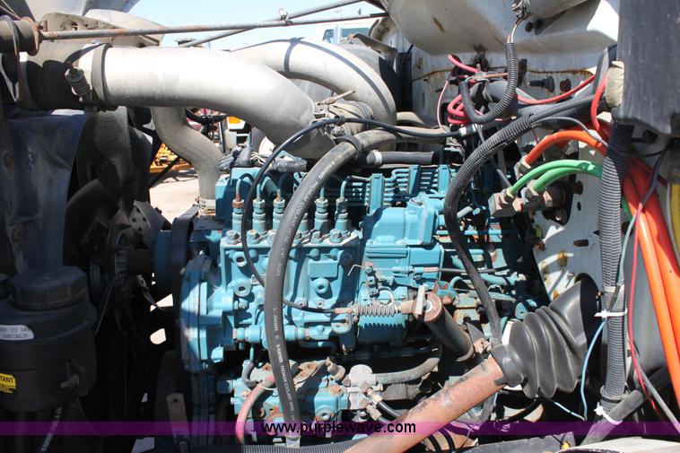 image for item A2892 1995 International 4900 tandem axle dump truck with plow and spreader