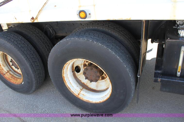 image for item A2892 1995 International 4900 tandem axle dump truck with plow and spreader