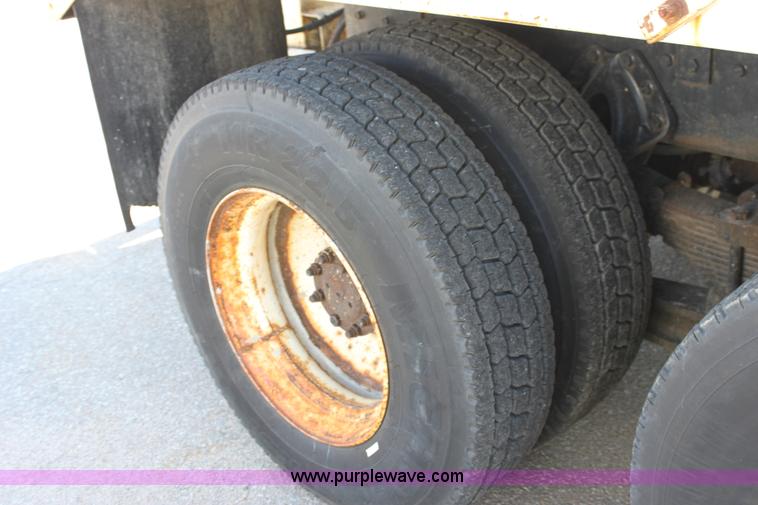 image for item A2892 1995 International 4900 tandem axle dump truck with plow and spreader