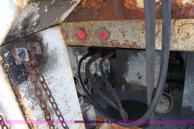 image for item A2892 1995 International 4900 tandem axle dump truck with plow and spreader