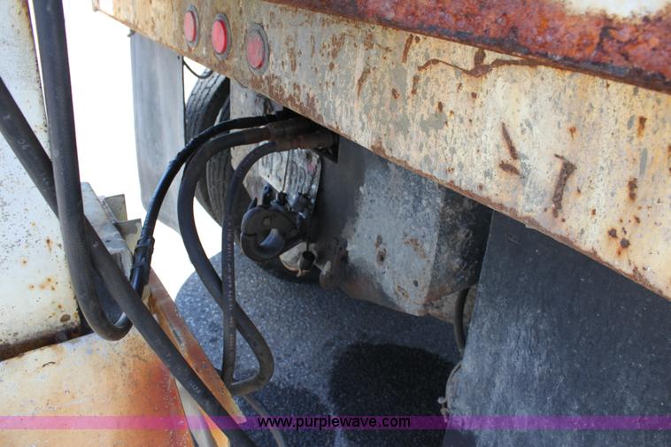 image for item A2892 1995 International 4900 tandem axle dump truck with plow and spreader