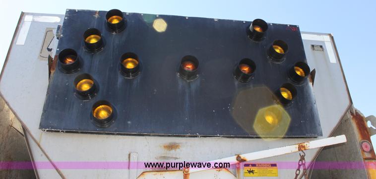 image for item A2892 1995 International 4900 tandem axle dump truck with plow and spreader