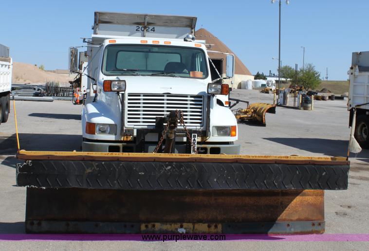 image for item A2893 1999 International 4900 tandem axle dump truck with plow and spreader