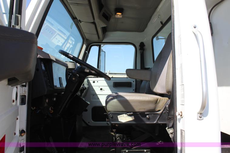 image for item A2893 1999 International 4900 tandem axle dump truck with plow and spreader