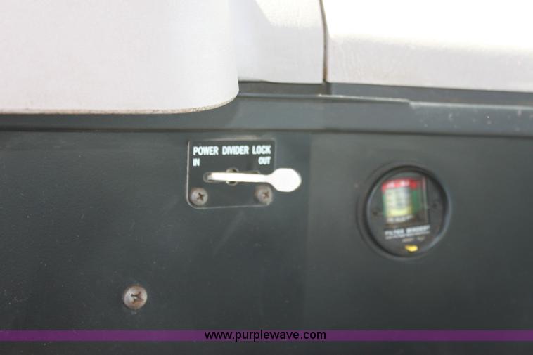 image for item A2893 1999 International 4900 tandem axle dump truck with plow and spreader