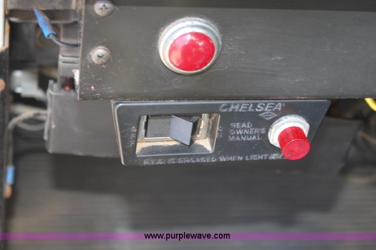 image for item A2893 1999 International 4900 tandem axle dump truck with plow and spreader