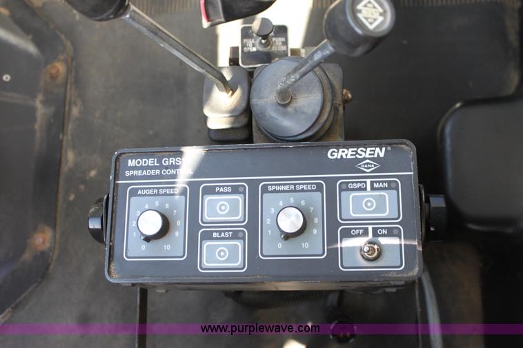 image for item A2893 1999 International 4900 tandem axle dump truck with plow and spreader