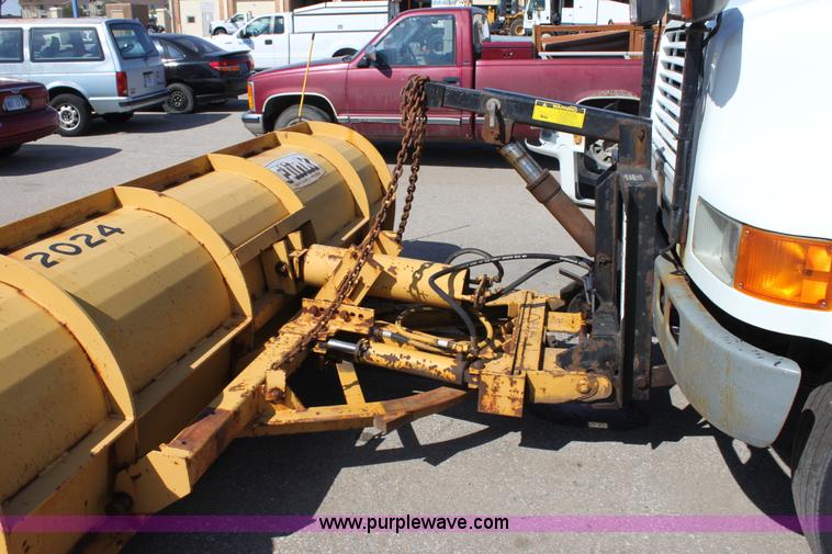 image for item A2893 1999 International 4900 tandem axle dump truck with plow and spreader