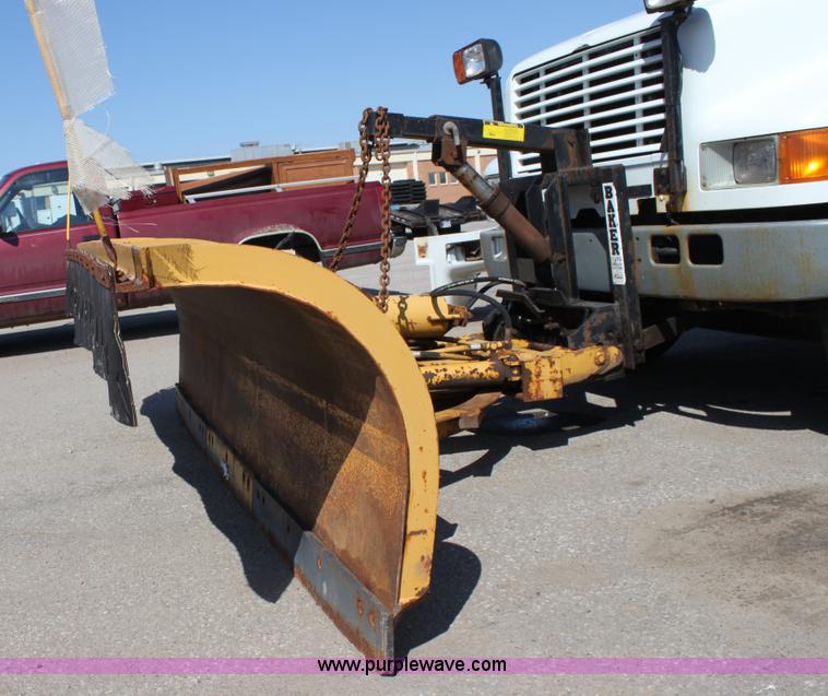 image for item A2893 1999 International 4900 tandem axle dump truck with plow and spreader